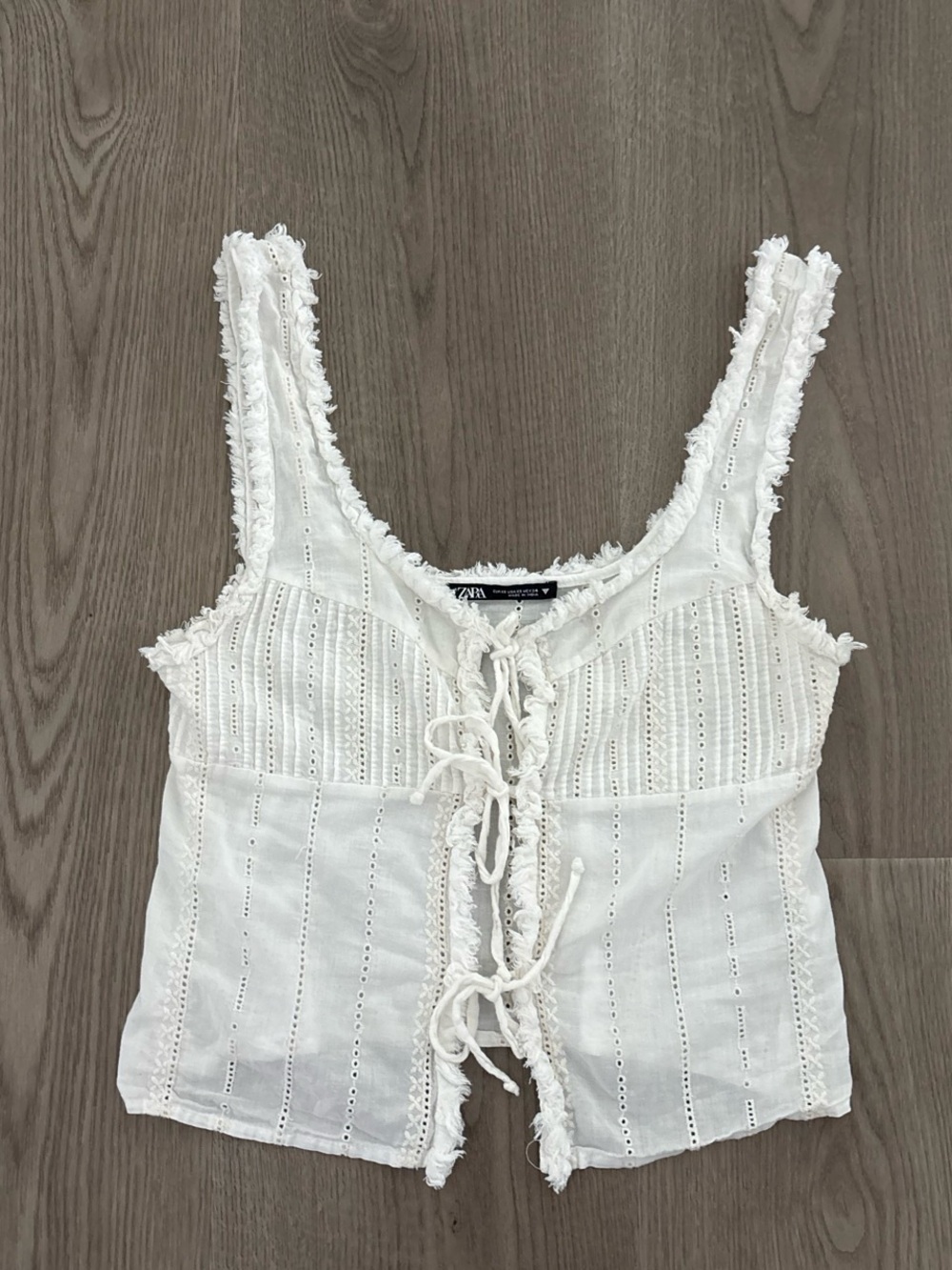 White Zara crop top with eyelet lace and frayed edges size small